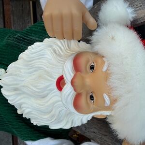 Festive Santa Claus Figure with Green Outfit